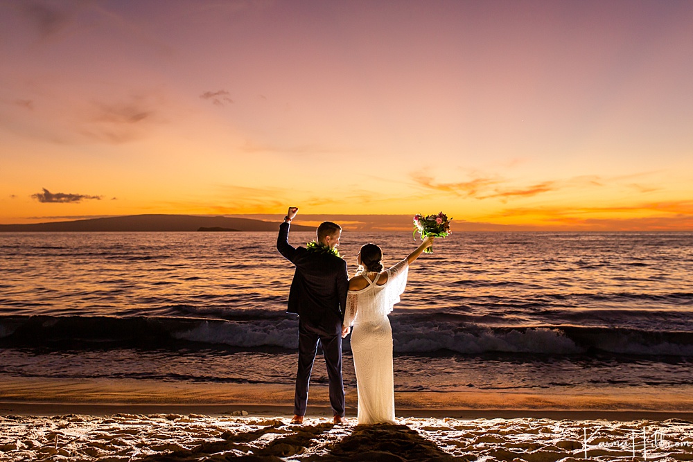couple in front of the sunset on Maui 