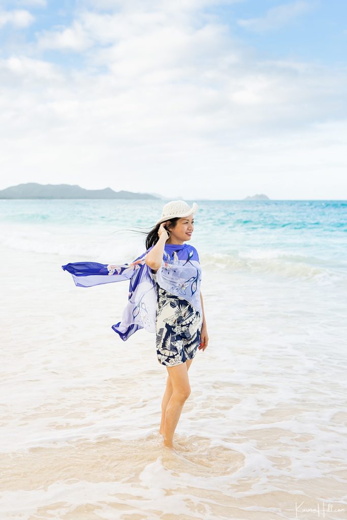 woman standing in the ocean 