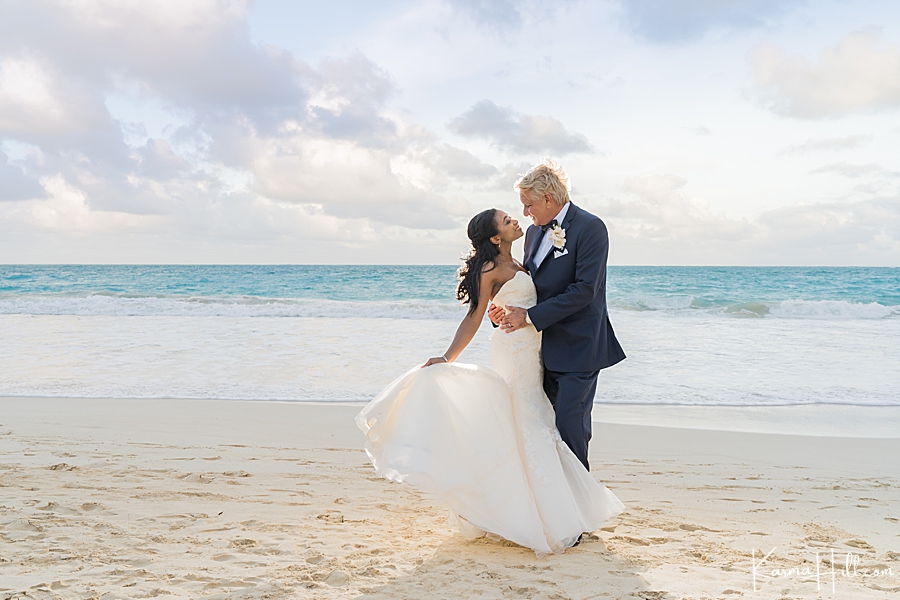 bride and groom on Waimanalo Beach