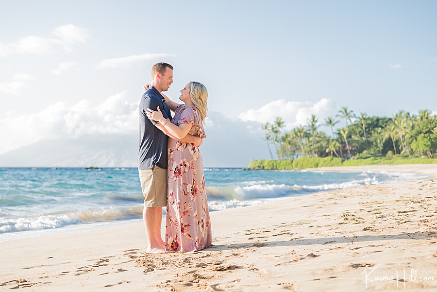 man and woman embracing on a maui beach 