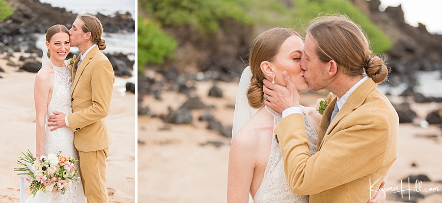 bride and groom embrace on a beach in hawaii 