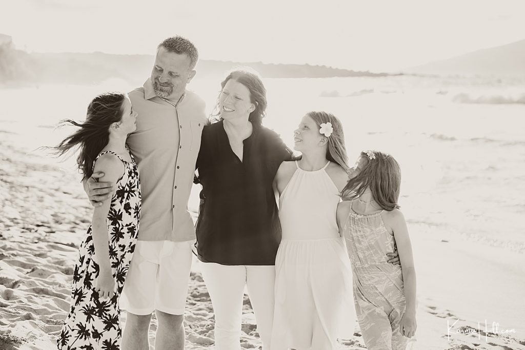 black and white family photo on ironwoods beach in maui 