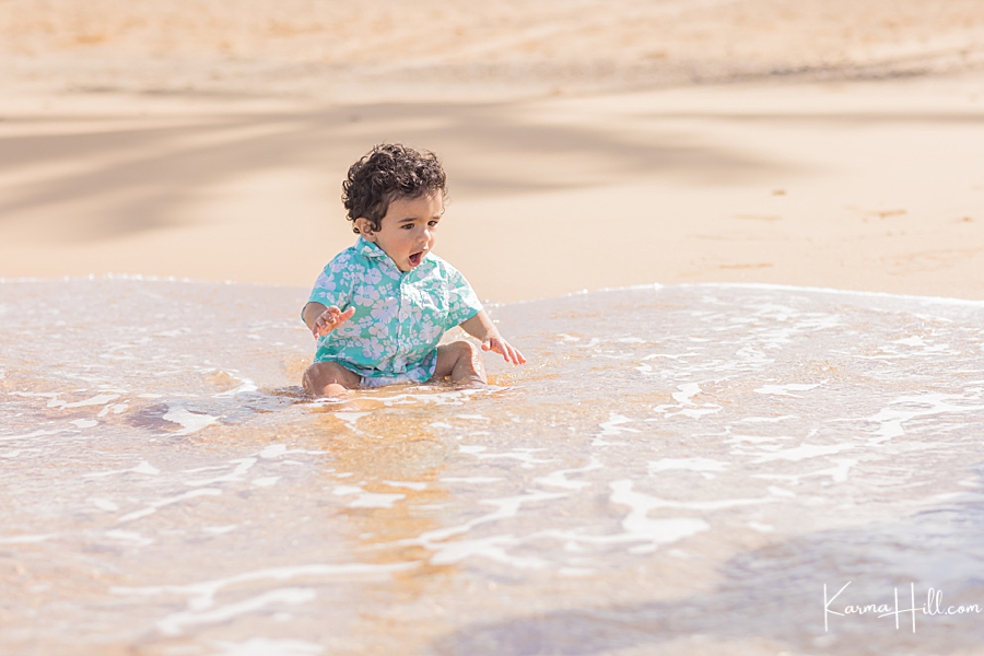 baby splashing in kauai beach photos