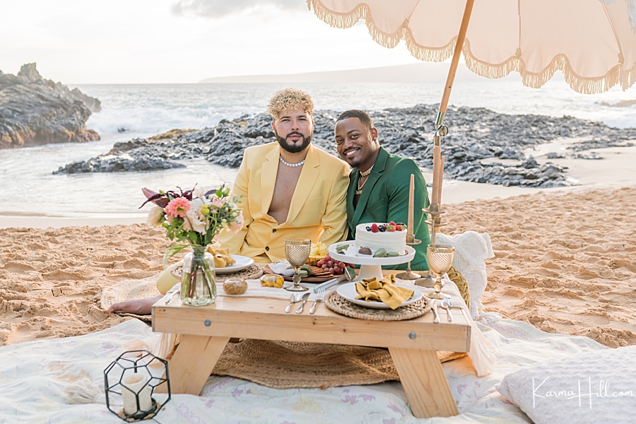 couple at beach wedding picnic in maui