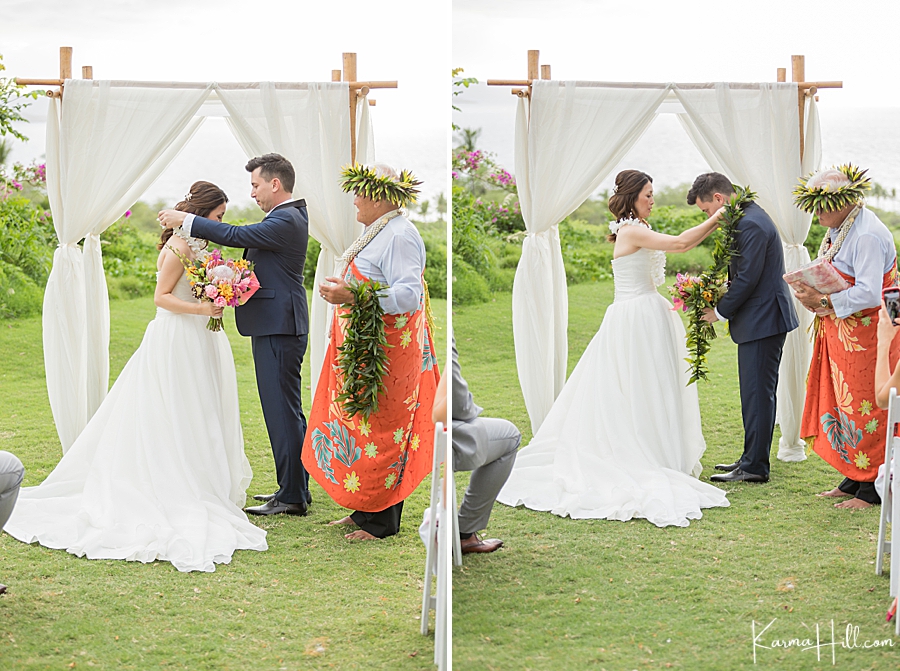 bride and groom exchange leis