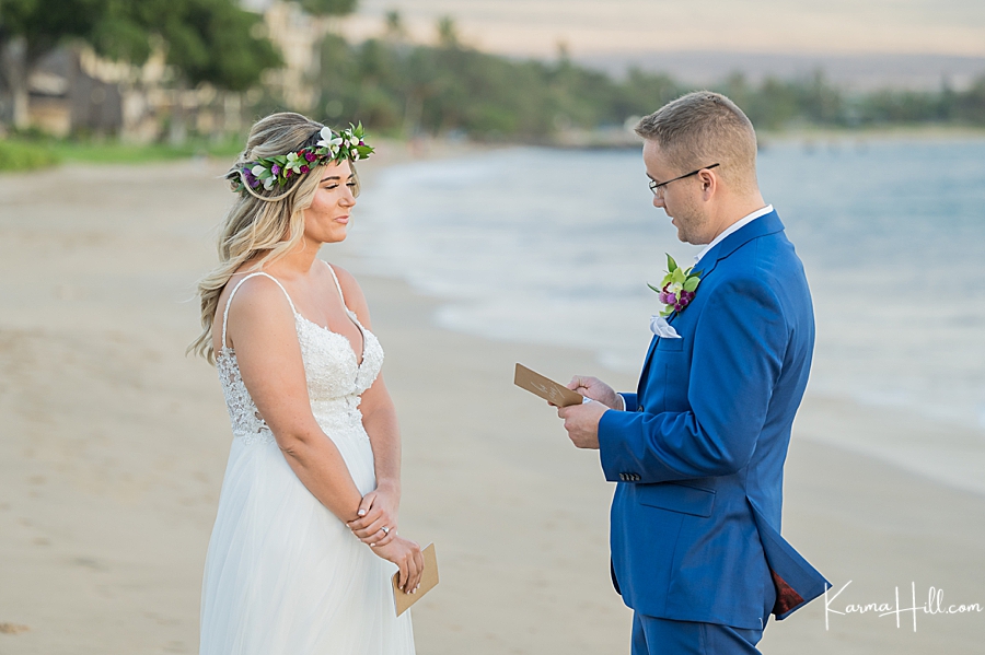 groom telling vows to bride