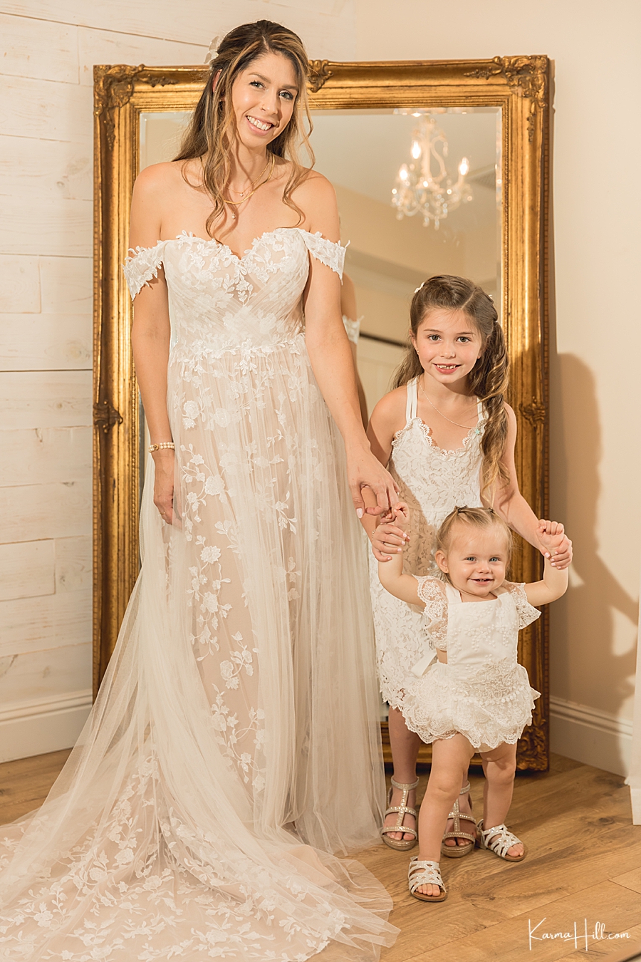 bride with daughters at hawaii wedding