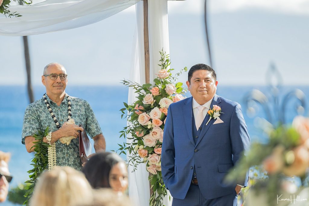 groom standing at altar at maui wedding