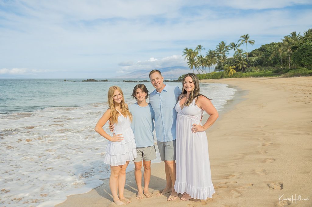 family portrait on beach in maui