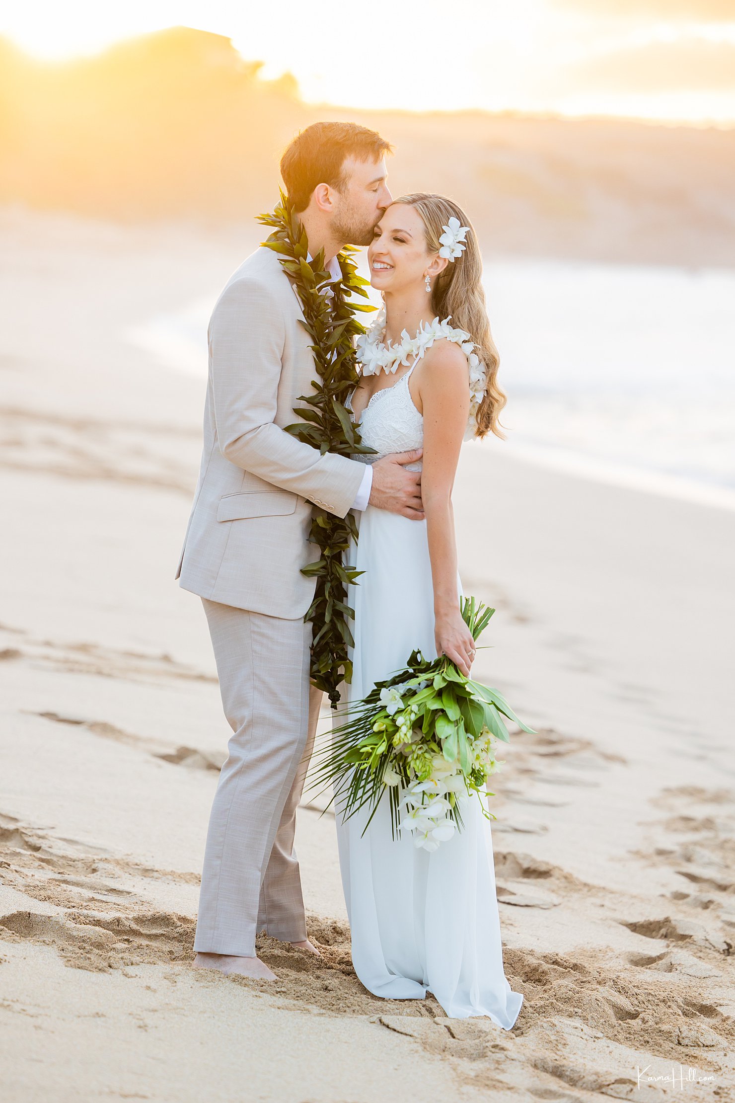 newlyweds at ironwoods beach in maui