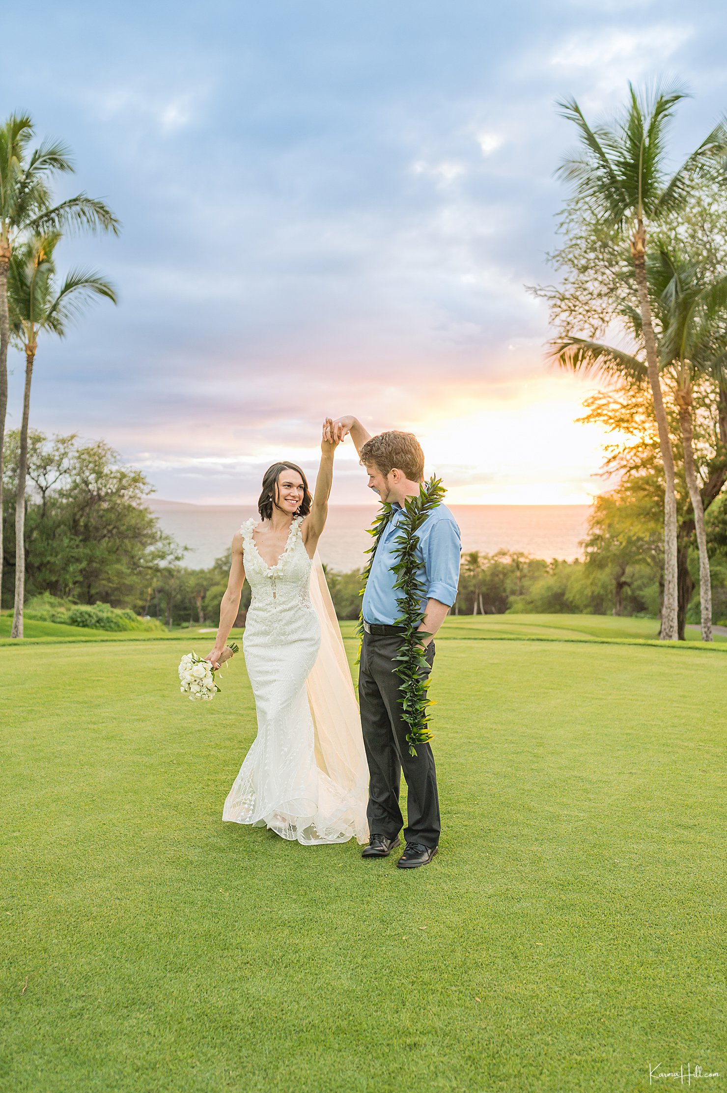 newlyweds in maui at sunset