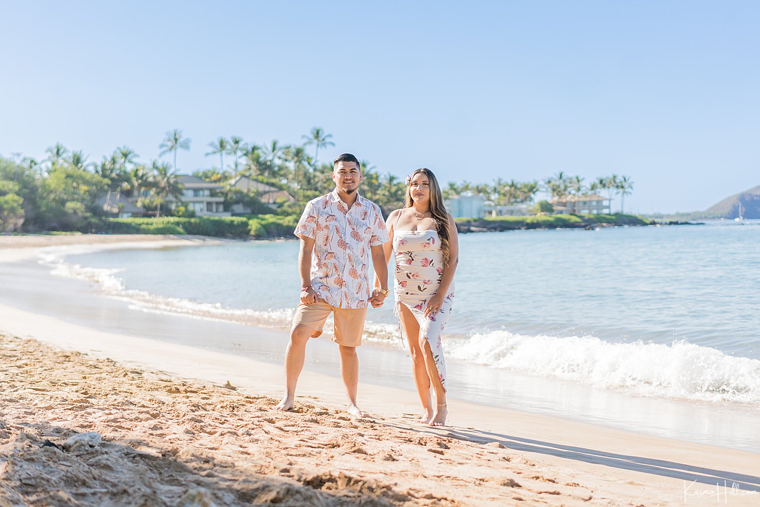 happy couple on beach in hawaii