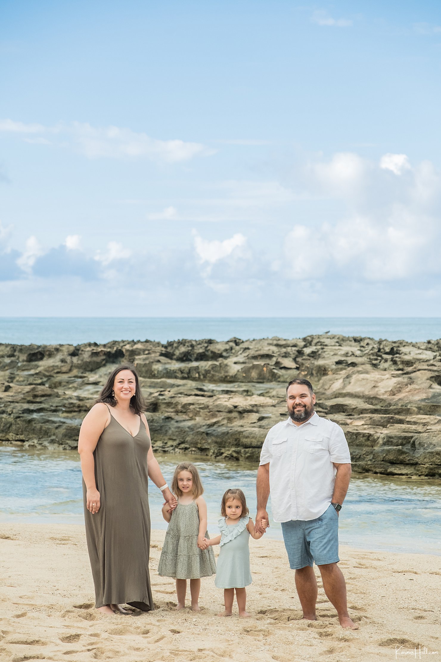 family portrait at beach in oahu