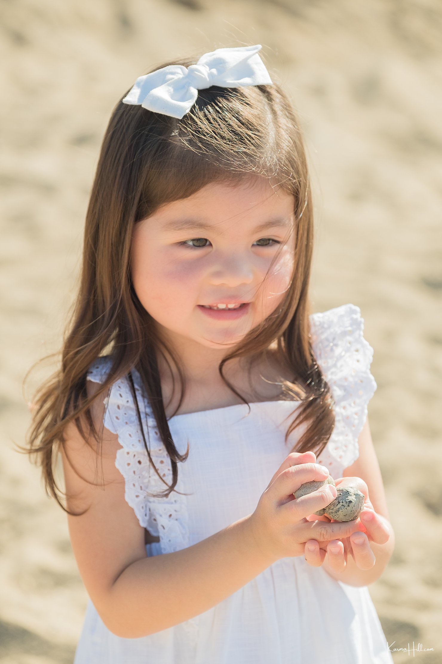 little girl on the beach in Hawaii