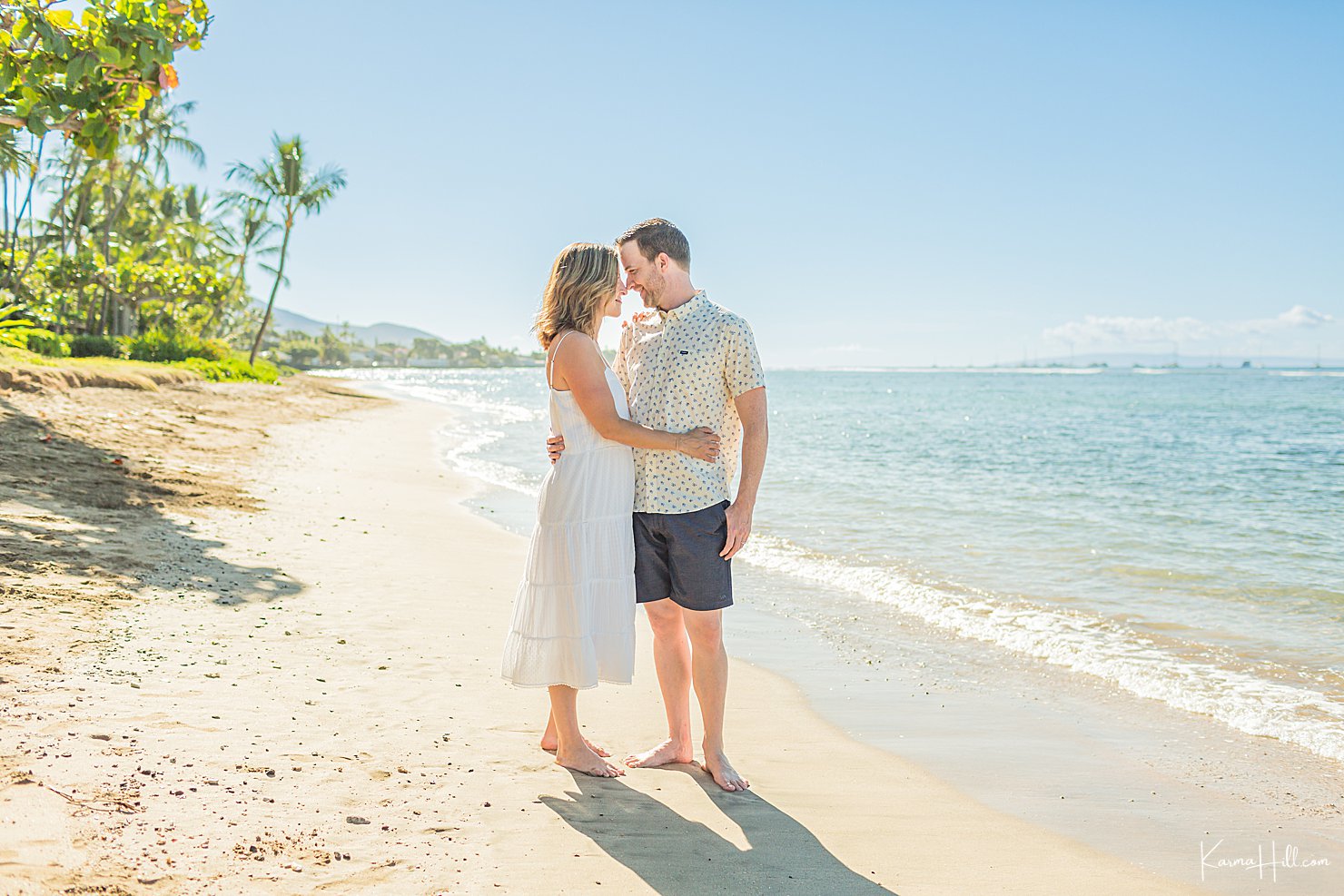 husband and wife on beach