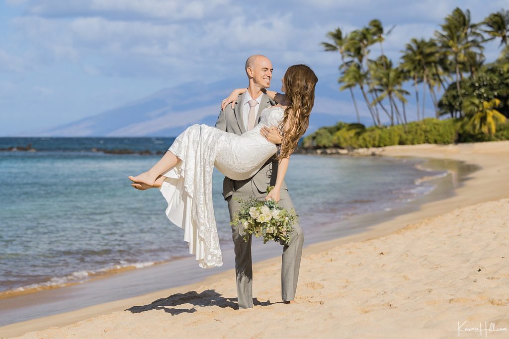 bride and groom on beach 
