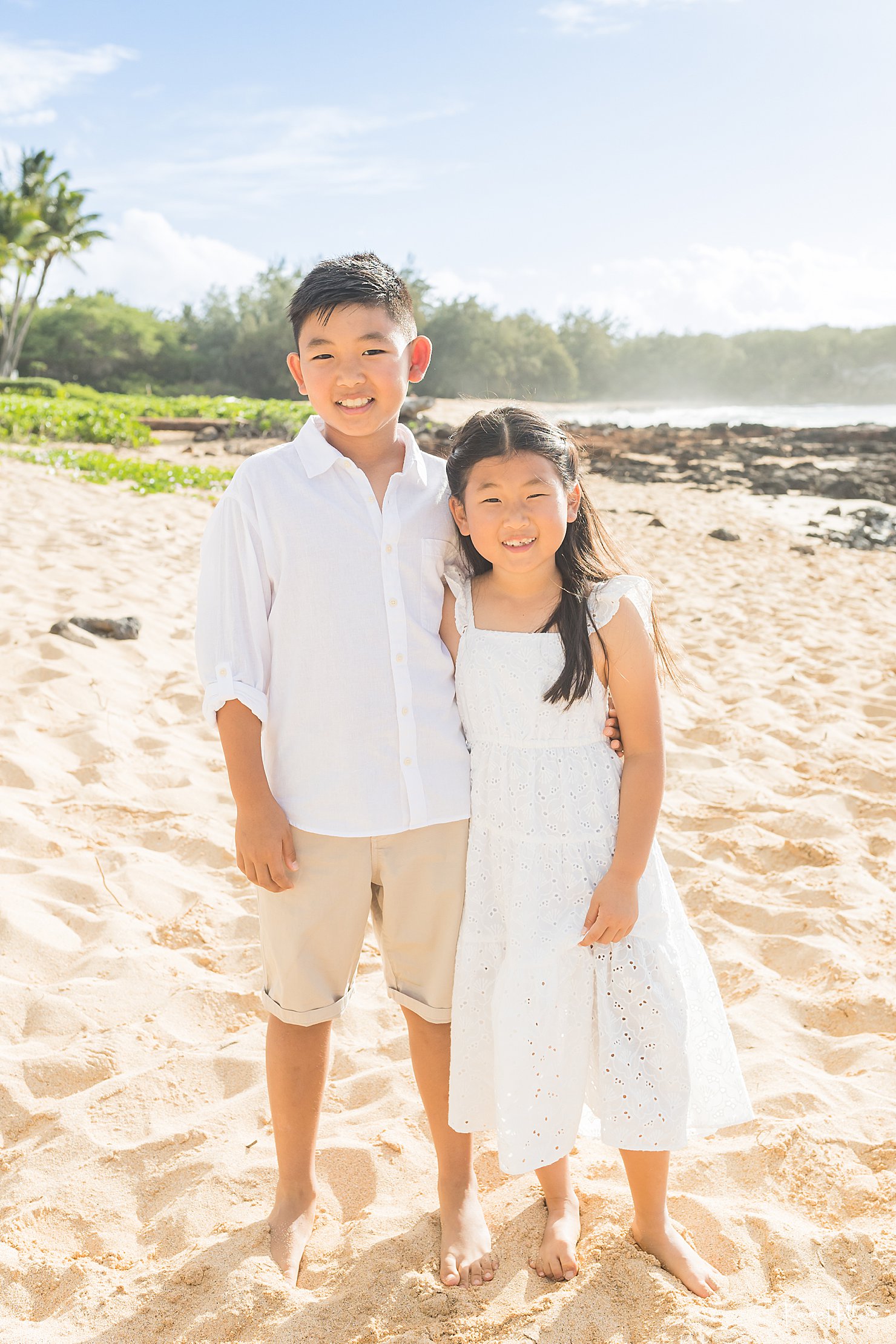 kids on beach in kauai