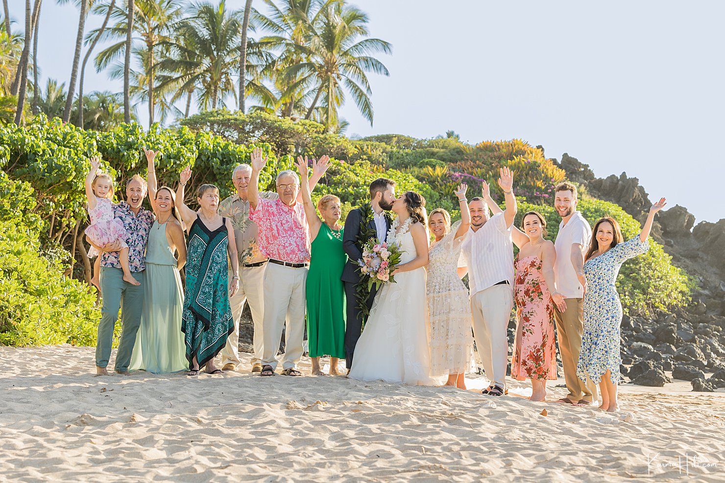 happy family at beach wedding 