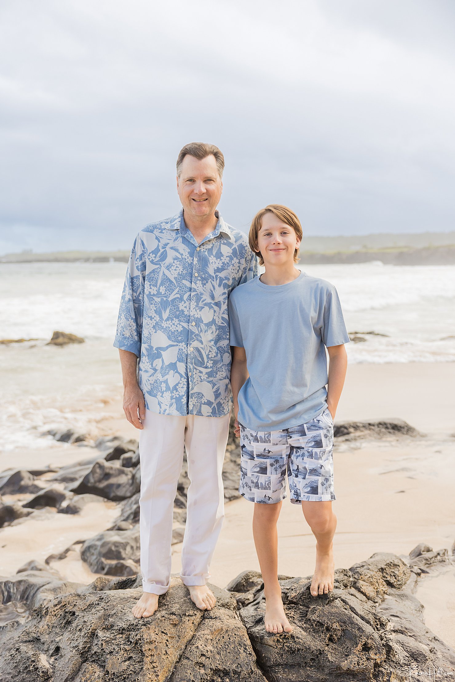 father and son on beach