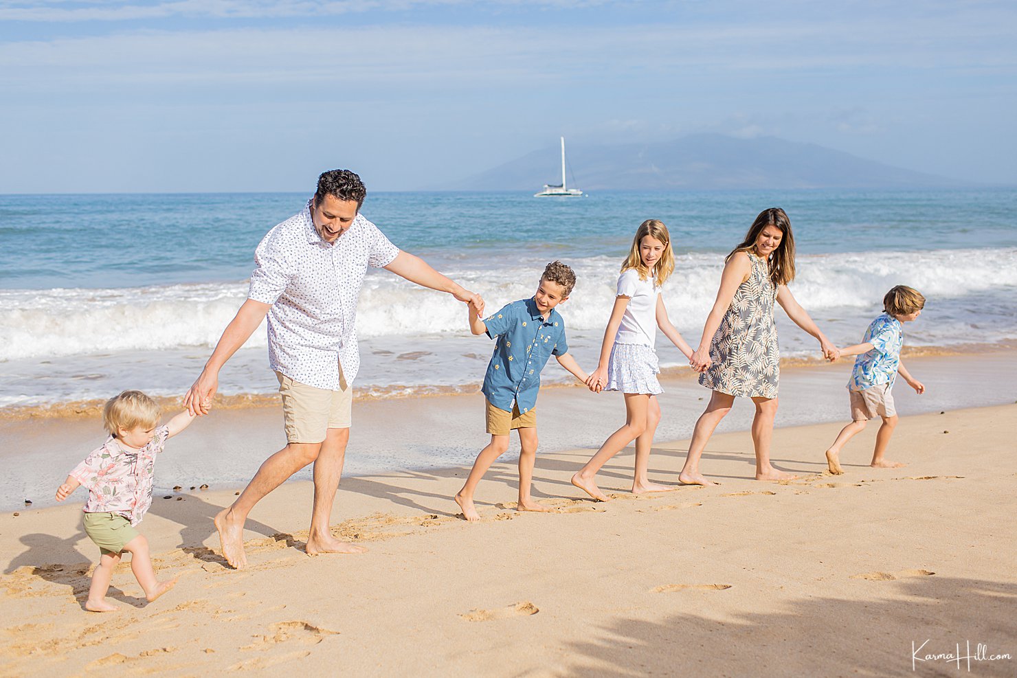 family walking on beach 