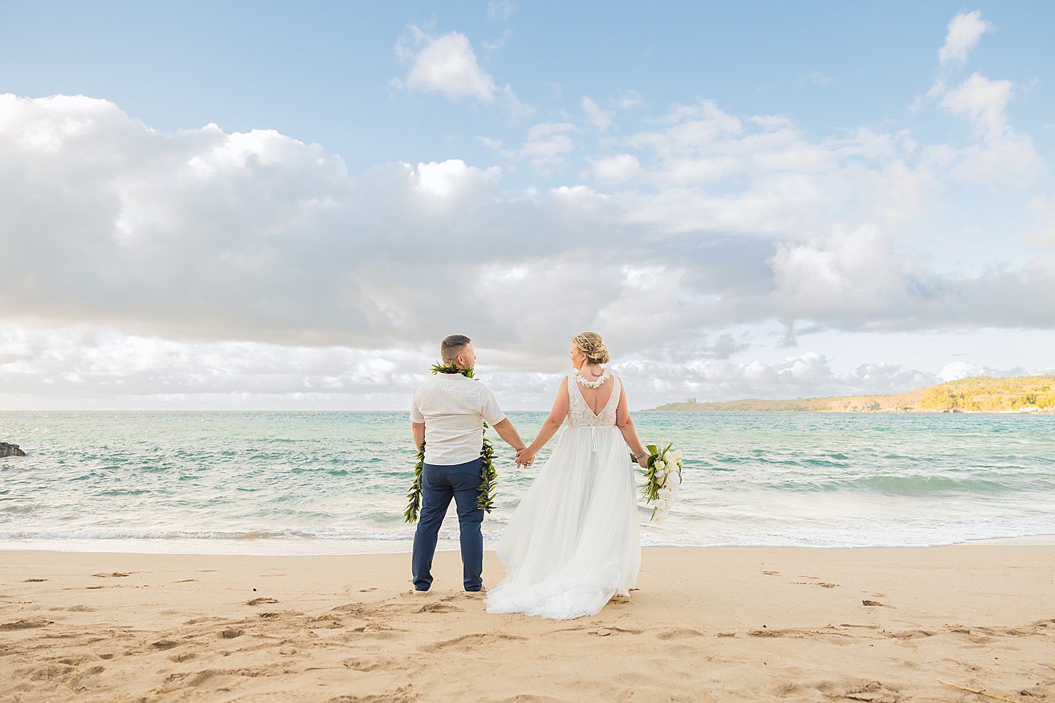 newlyweds on beach 