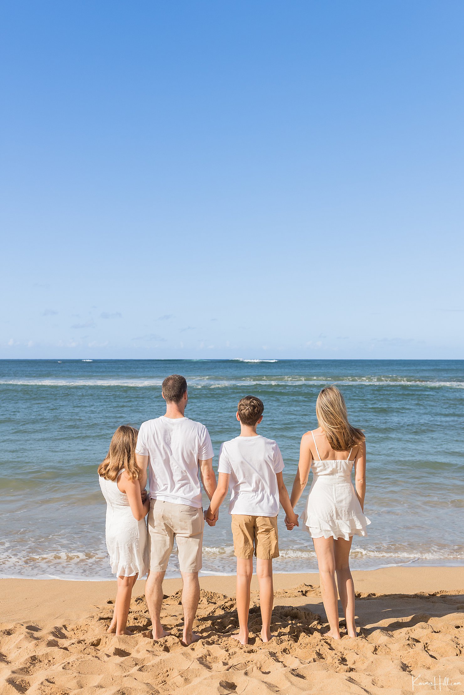 family on beach in hawaii 
