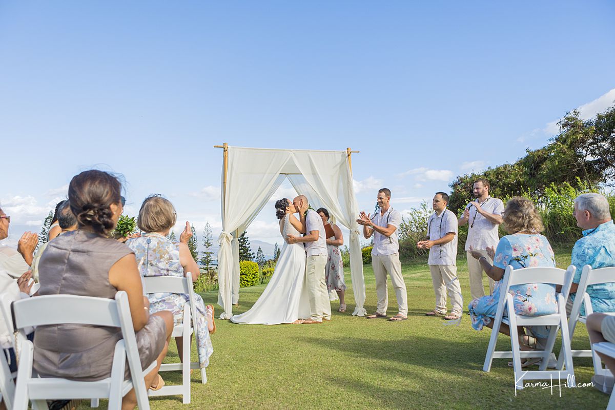 wedding photo of kissing the bride in Maui Hawaii